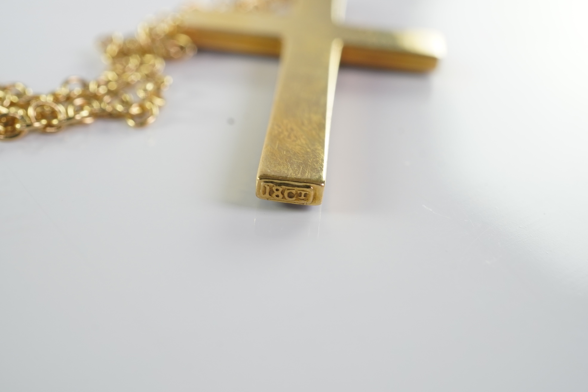 An Edwardian pearl and enamel cross and chain, early 20th century
